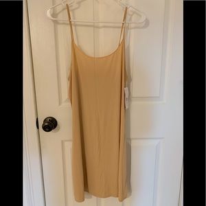Brand New w/tags. Nude color slip
